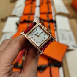 Replica Hermes red leather watch with diamond bezel and hardware options