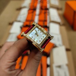 Replica Hermes red leather watch with diamond bezel and hardware options