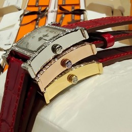Replica Hermes red leather watch with diamond bezel and hardware options