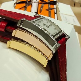 Replica Hermes red leather watch with diamond bezel and hardware options