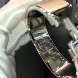 Replica Hermes silver tone wide H cuff bracelet with polished finish