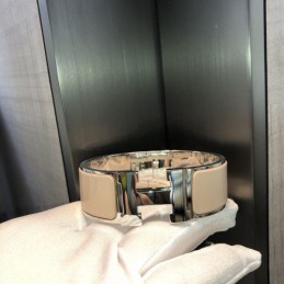 Replica Hermes silver tone wide H cuff bracelet with polished finish