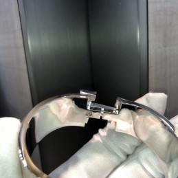 Replica Hermes silver tone wide H cuff bracelet with polished finish