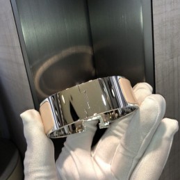 Replica Hermes silver tone wide H cuff bracelet with polished finish