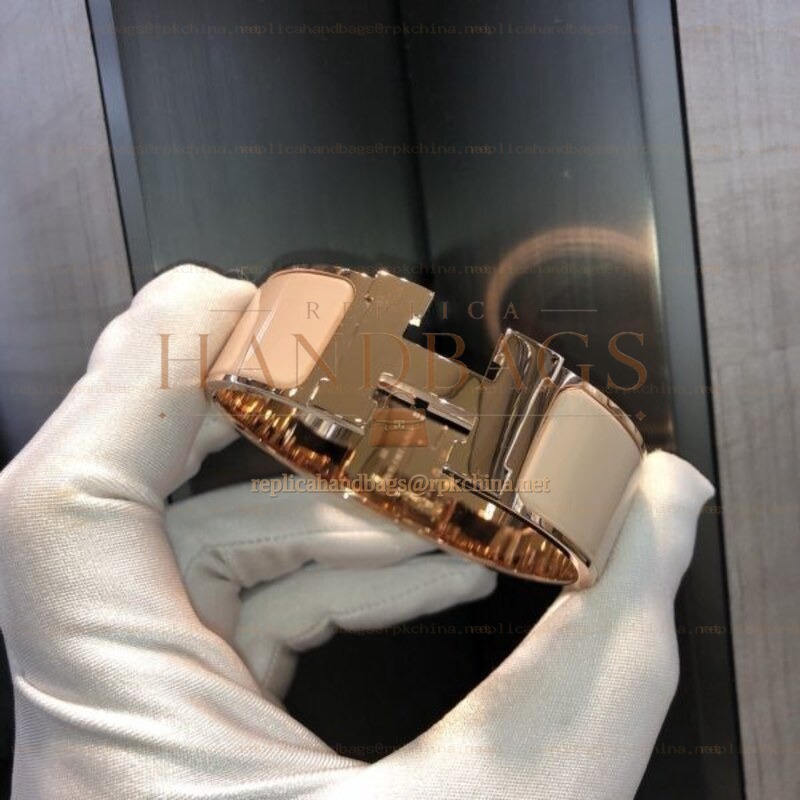 Replica Hermes rose gold wide H cuff bracelet with polished finish
