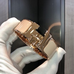 Replica Hermes rose gold wide H cuff bracelet with polished finish