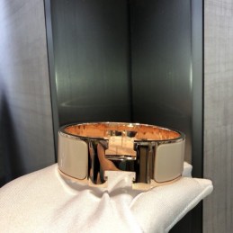 Replica Hermes rose gold wide H cuff bracelet with polished finish