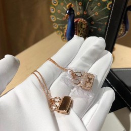 Replica Hermes rose gold lock pendant necklace with sparkling stones