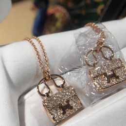Replica Hermes rose gold lock pendant necklace with sparkling stones