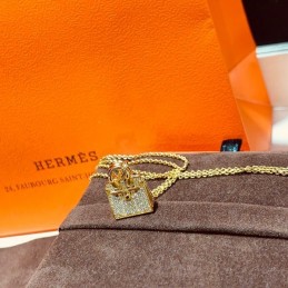 Replica Hermes gold diamond padlock necklace with sparkling stones