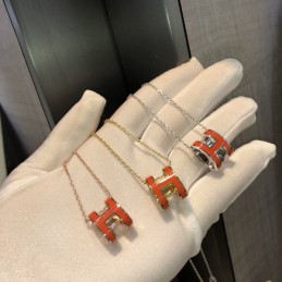 Replica Hermes orange H pendant necklace with plated hardware options