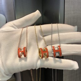 Replica Hermes orange H pendant necklace with plated hardware options