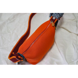 Replica Hermes Orange Trousse Bride Charm Bag