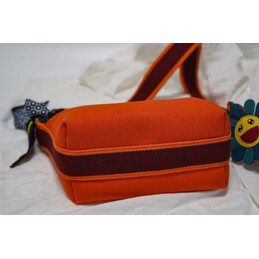 Replica Hermes Orange Trousse Bride Charm Bag