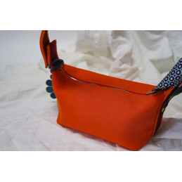 Replica Hermes Orange Trousse Bride Charm Bag