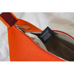 Replica Hermes Orange Trousse Bride Horse Charm Bag
