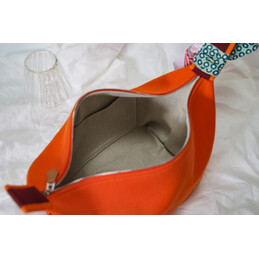 Replica Hermes Orange Trousse Bride Horse Charm Bag