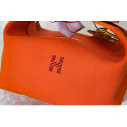 Replica Hermes Orange Trousse Bride Horse Charm Bag