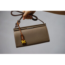 Replica Hermes Taupe Clic H 21 Charm Bag