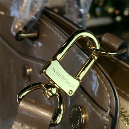 Replica Louis Vuitton Beige Patent Monogram Brea MM
