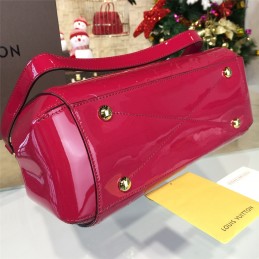 Replica Louis Vuitton Fuchsia Embossed Monogram Montaigne MM