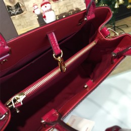 Replica Louis Vuitton Fuchsia Embossed Monogram Montaigne MM