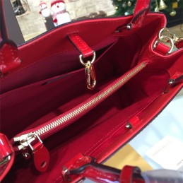 Replica Louis Vuitton Red Embossed Monogram Montaigne MM
