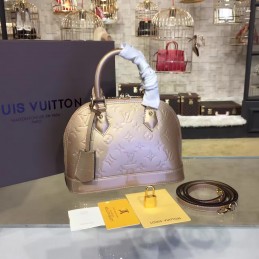 Replica Louis Vuitton Champagne Embossed Monogram Alma BB