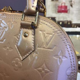 Replica Louis Vuitton Champagne Embossed Monogram Alma BB