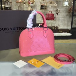 Replica Louis Vuitton Bright Pink Embossed Monogram Alma BB