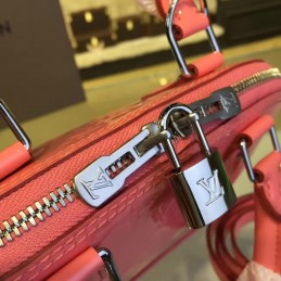 Replica Louis Vuitton Bright Pink Embossed Monogram Alma BB