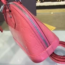 Replica Louis Vuitton Bright Pink Embossed Monogram Alma BB