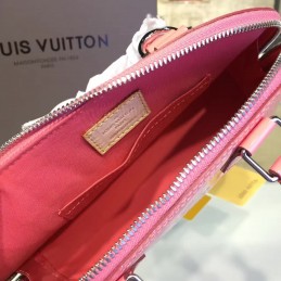 Replica Louis Vuitton Bright Pink Embossed Monogram Alma BB