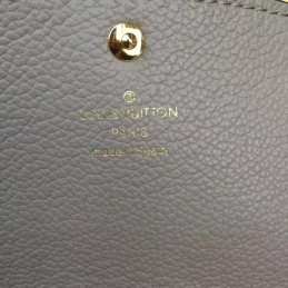 Replica Louis Vuitton Pink Embossed Monogram Emilie Wallet