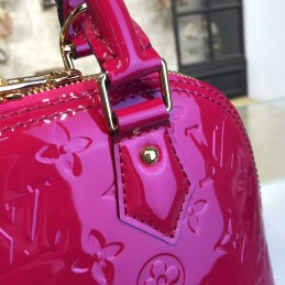 Replica Louis Vuitton Fuchsia Embossed Monogram Alma BB