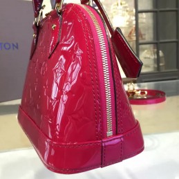 Replica Louis Vuitton Fuchsia Embossed Monogram Alma BB