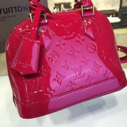 Replica Louis Vuitton Fuchsia Embossed Monogram Alma BB