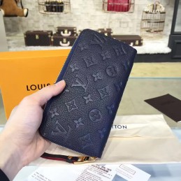 Replica Louis Vuitton Navy Embossed Monogram Zippy Wallet