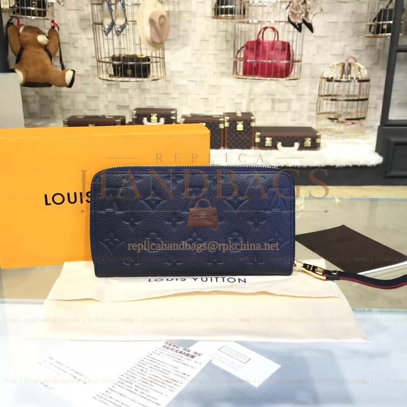 Replica Louis Vuitton Navy Embossed Monogram Zippy Wallet