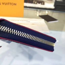 Replica Louis Vuitton Navy Embossed Monogram Zippy Wallet