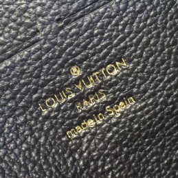 Replica Louis Vuitton Navy Embossed Monogram Zippy Wallet
