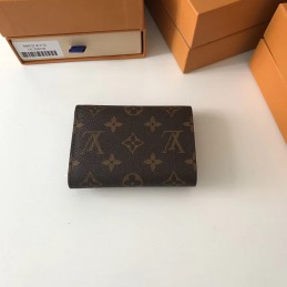 Replica Louis Vuitton Brown Monogram Black Snap Victorine Wallet