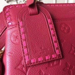 Replica Louis Vuitton Bright Pink Embossed Monogram Vosges MM