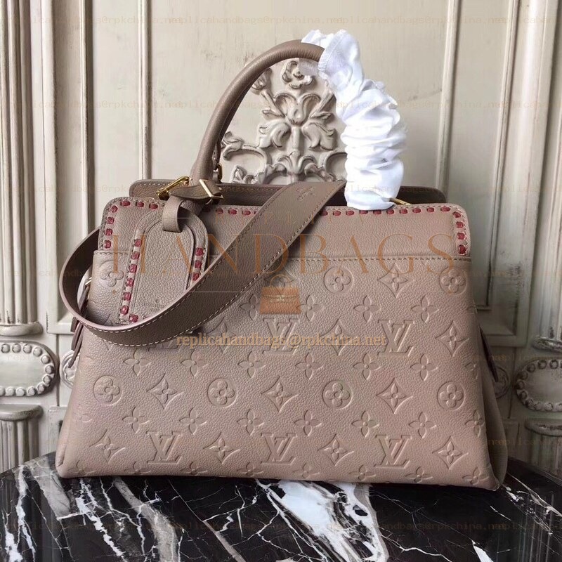 Replica Louis Vuitton Taupe Embossed Monogram Vosges MM