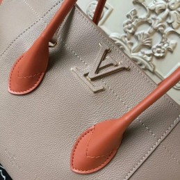 Replica Louis Vuitton Taupe Brown Freedom Bag
