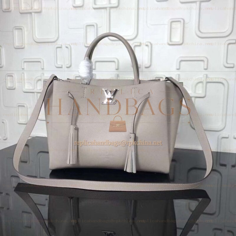 Replica Louis Vuitton Taupe Textured Lockmeto