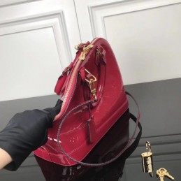 Replica Louis Vuitton Fuchsia Patent Embossed Monogram Alma PM