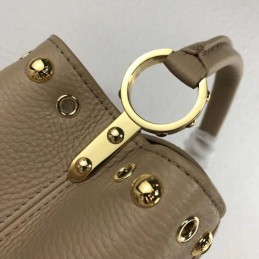 Replica Louis Vuitton Taupe Studded Capucines PM