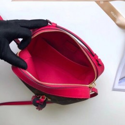 Replica Louis Vuitton Brown Monogram Fuchsia Trim Saintonge