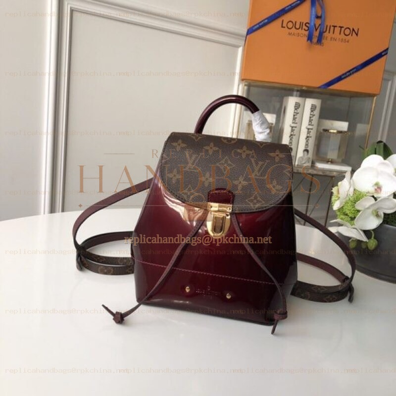 Replica Louis Vuitton Brown Monogram Burgundy Hot Springs Backpack